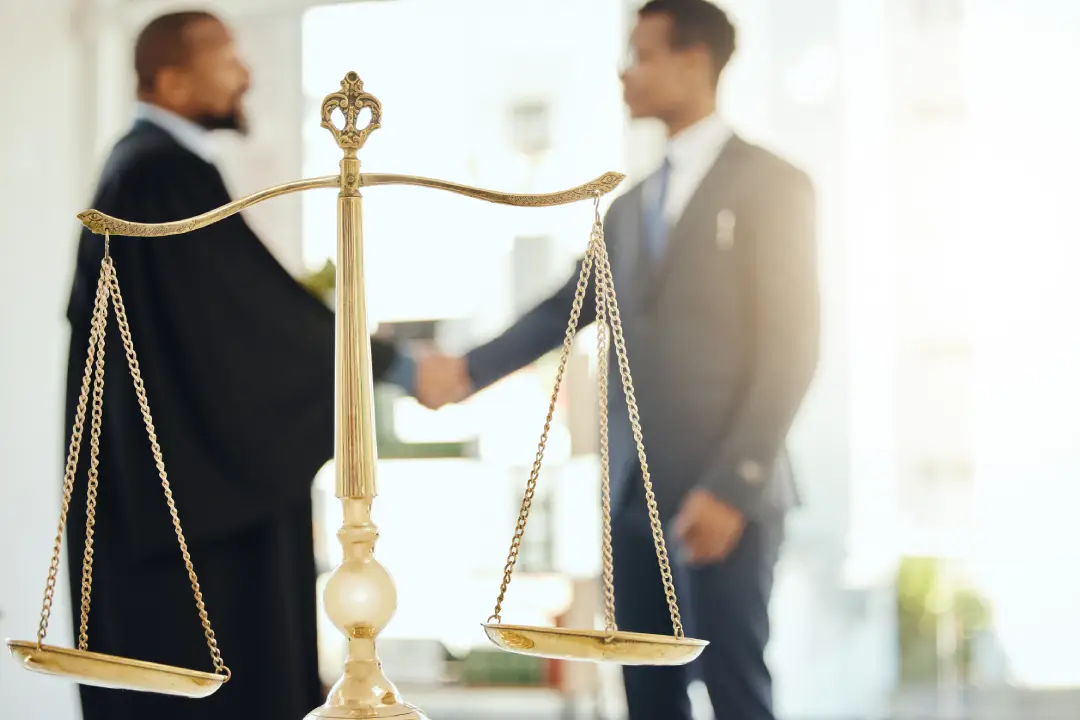 Legal professionals reaching an agreement